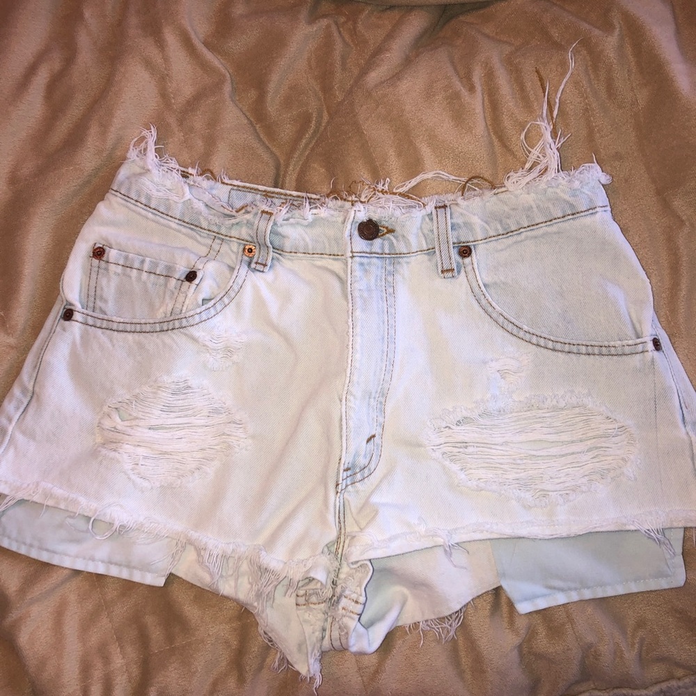 Levi’s 560 loose fit tapered leg distressed shorts